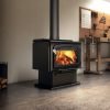 Drolet Escape 2100 Wood Burning Stove installed in a modern living room with warm flames inside